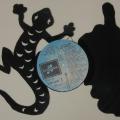Décoration découpée à la scie à chantourner dans un disque vinyle représentant une salamandre corse et l'île de beauté.